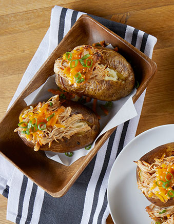 baked bbq potatoes served